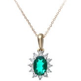 0.6ct Oval Emerald and 0.25ct Diamond Cluster Pendant in UK Hallmarked 9ct Yellow Gold